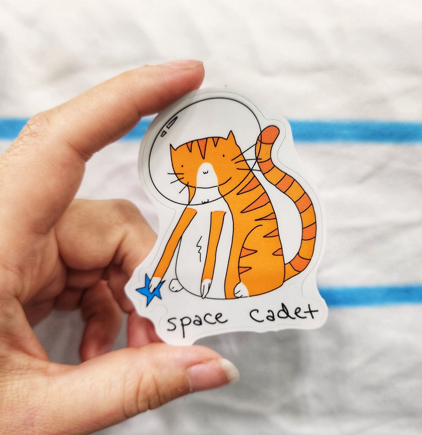 Space Cadet Orange Tabby Cat Sticker: Weatherproof Vinyl