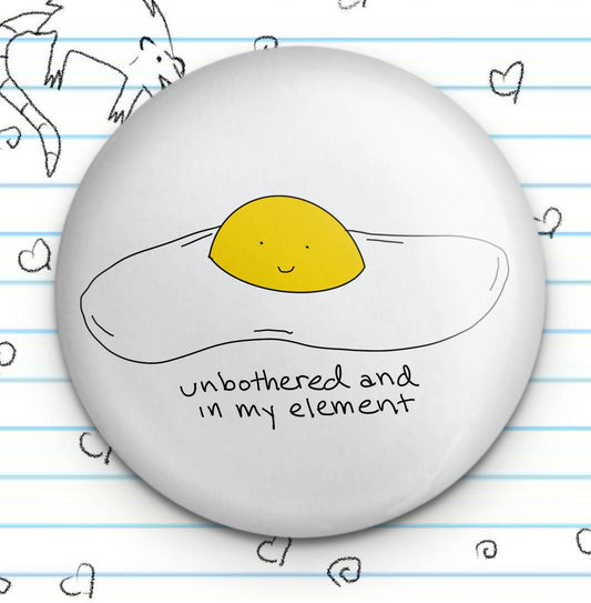 Unbothered and In My Element Fried Egg 1.25" Badge Button